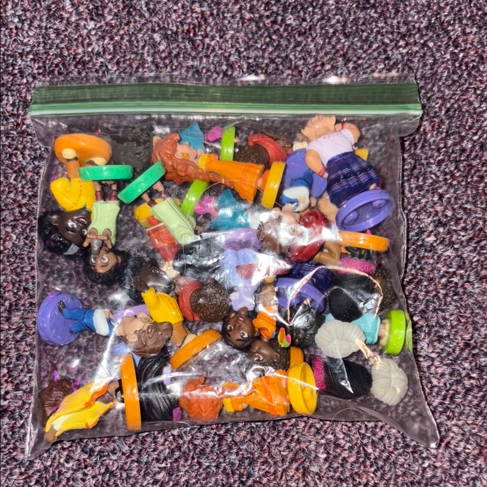 Two sets of Encanto mini figures